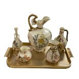 Large Royal Worcester ewer and four smaller pieces with foliate on ivory ground.