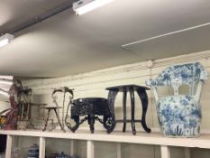 Oriental carved wood stand, carved table, blue and white pottery chair, brass mirrored firescreen,