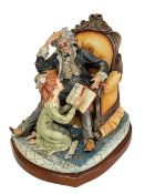 Large Capo di Monte group of 'The Story Teller' on wood plinth.