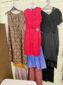 Collection of ladies vintage evening gowns.