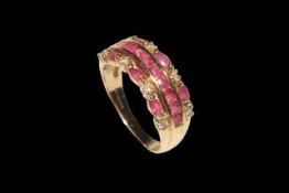 Ruby and diamond dress ring in 9 carat yellow gold.