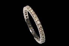 18 carat white gold eternity ring, size N.