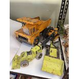 Collection of Tonka trucks and diggers.