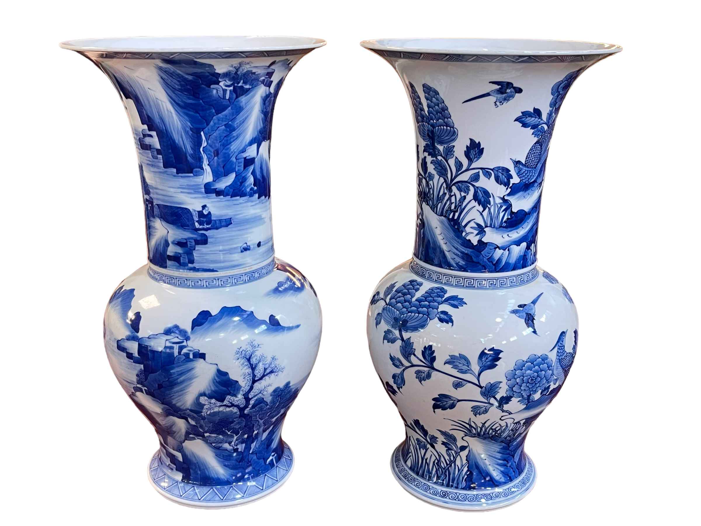 Two large Chinese blue and white vases with landscape and exotic bird decoration, 44cm.