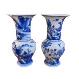 Two large Chinese blue and white vases with landscape and exotic bird decoration, 44cm.