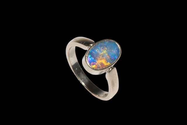 18 carat white gold and opal doublet ring.