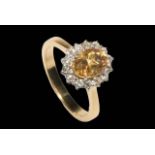 Citrine and diamond cluster ring set in 18 carat yellow gold,