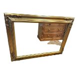 Rectangular gilt framed bevelled wall mirror, 120cm by 90cm.