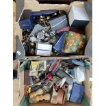 Two boxes with watches and collectables.