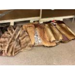 Collection of vintage fur coats.