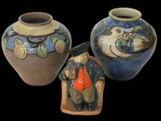 Doulton Lambeth toby and two Royal Doulton stoneware vases (3).