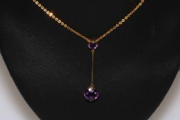 9 carat double amethyst pendant and chain.