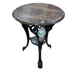 Ornate cast based pub table.