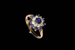 9 carat gold and sapphire ring.