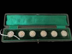 Boxed set of six Edwardian silver buttons with figure decoration, Birmingham 1902.