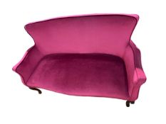 Cabriole leg settee with serpentine front seat in cerise draylon.