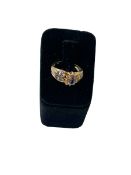 Tanzanite and diamond fancy 10k gold ring, size N.