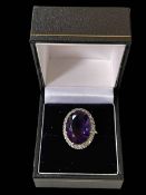 Large amethyst and diamond 18 carat white gold ring, stone 1.8cm by 1.2cm, size M/N.