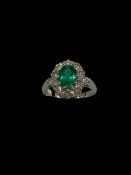 Emerald and diamond platinum ring,