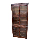 Early 20th Century Gunn oak three height stacking bookcase with six leaded glazed doors,