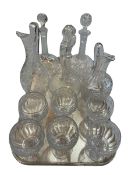 Antique glass decanters, jugs and set of six goblets.