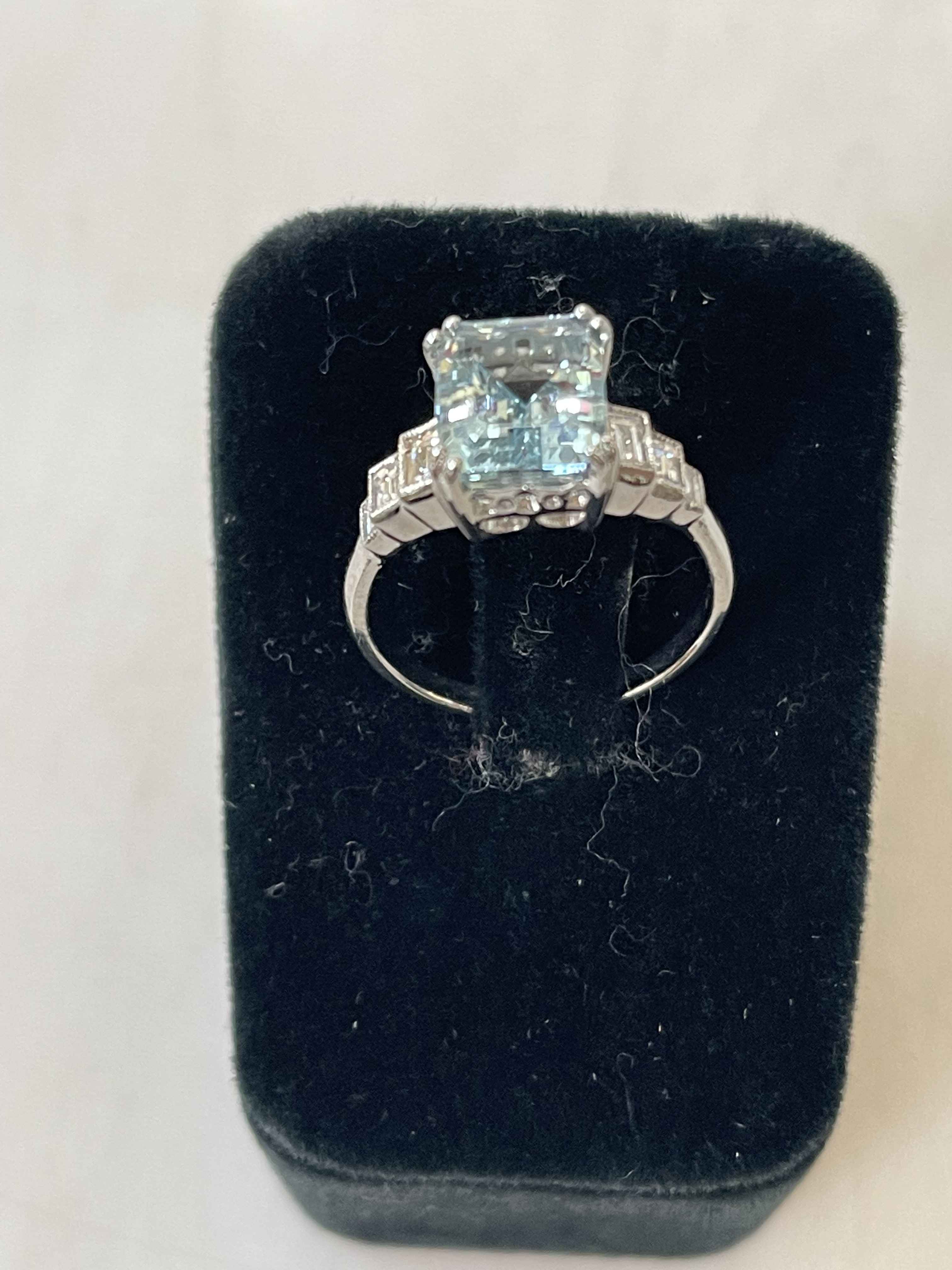 Aquamarine and diamond white gold ring, having 1.5 carat aqua with baguette set shoulders, size O. - Image 3 of 3