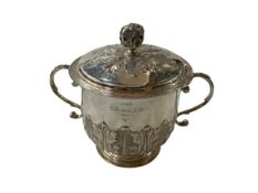 C S Harris & Sons silver covered two handle cup with embossed and chased ancanthus decoration,