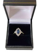 Small pretty sapphire and diamond 18 carat gold ring,