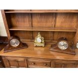 Two vintage inlaid mantel clocks and a gilt figural mantel clock.