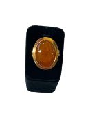 Amber 18 carat gold ring, size K.