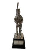 Silver presentation model of a Royal Hussar on plinth with inscribed plaque, London 1962,