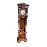 Continental carved triple weight longcase clock, 203cm.