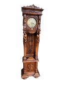 Continental carved triple weight longcase clock, 203cm.