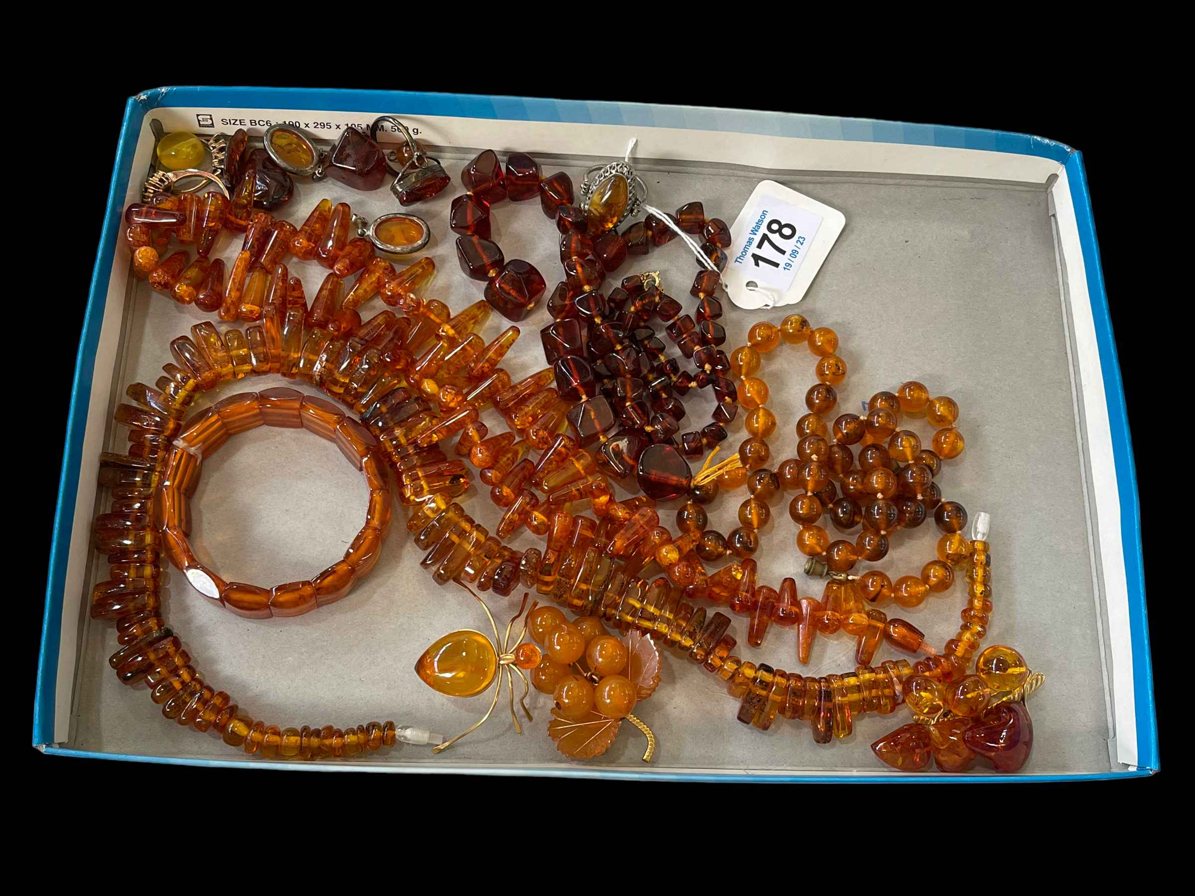 Collection of amber/amber coloured jewellery.