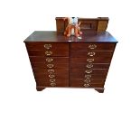 Mahogany finish filing chest of two banks of four drawers raised on bracket feet, 99cm by 40cm.