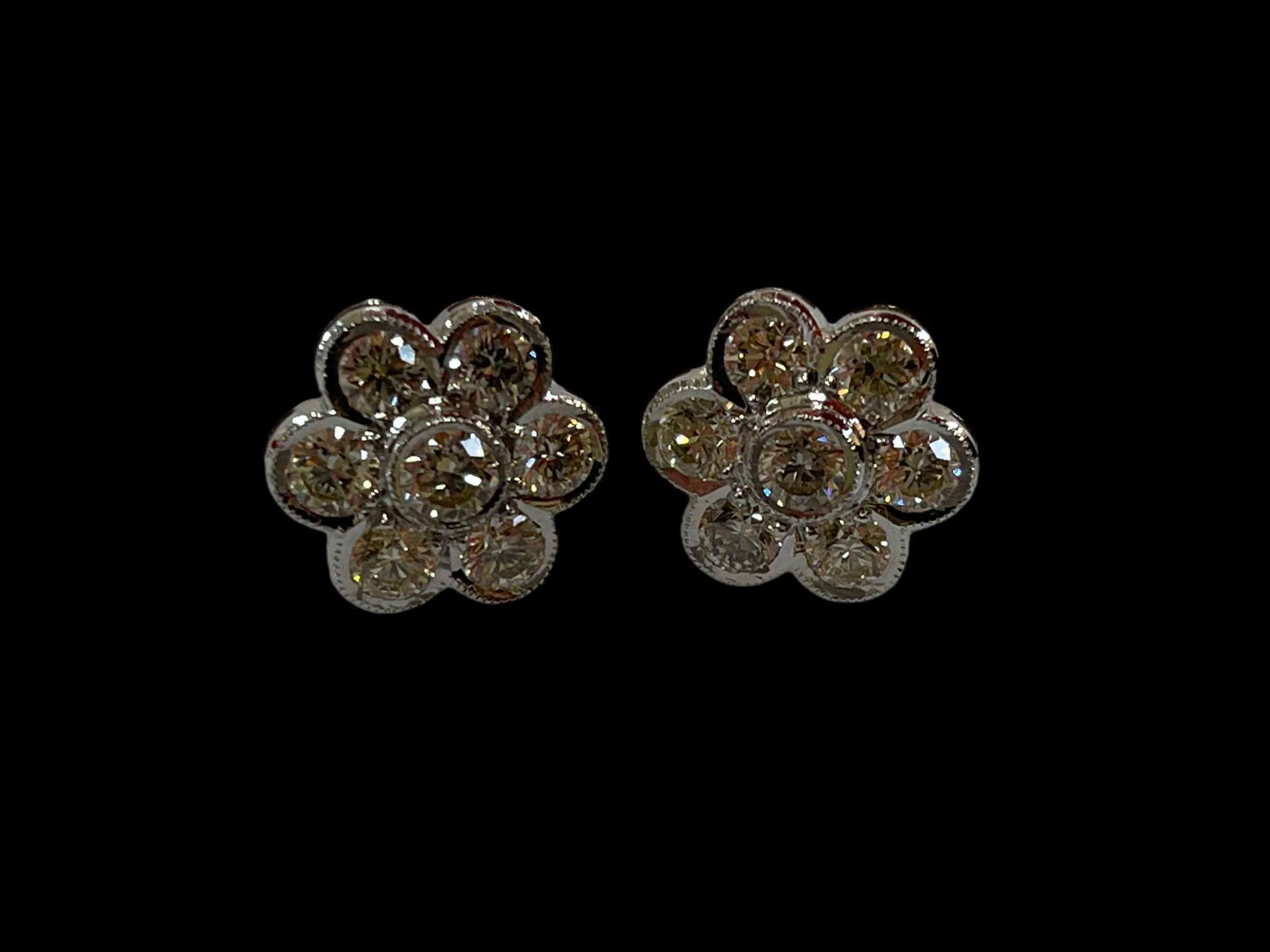 Very impressive diamond cluster 18k white gold earrings, each set with seven diamonds, - Image 2 of 3