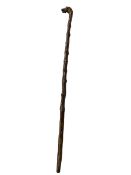 Antique carved dogs head walking stick.