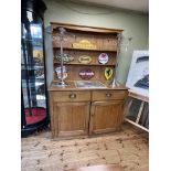 Victorian pine two drawer cabinet with later three tier rack, 203cm by 141cm by 63cm.