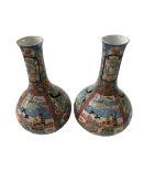 Pair of hand painted Japanese Meijiera Arita porcelain vases, 31cm high.