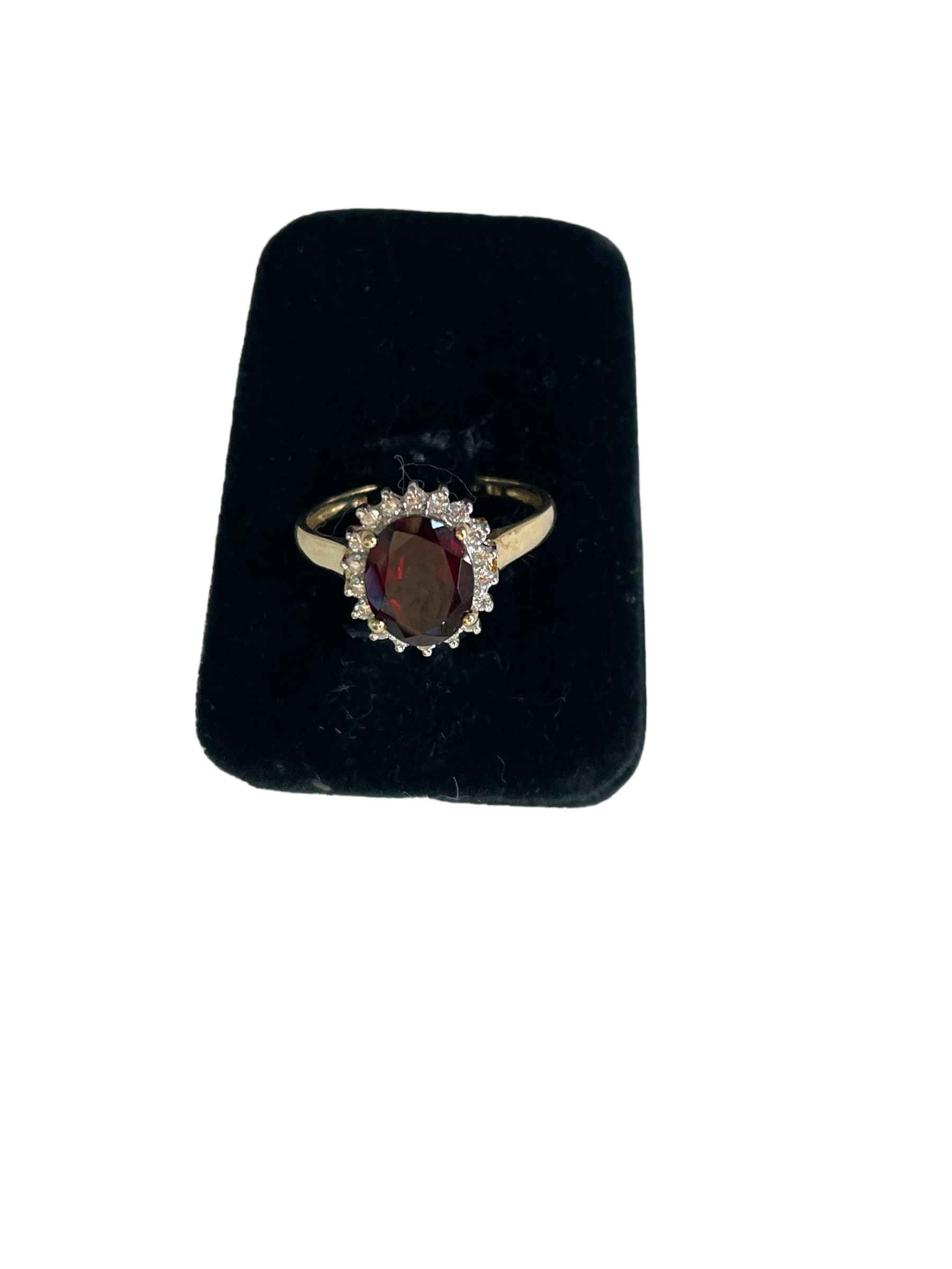 Garnet and diamond cluster 9 carat gold ring, size R/S.
