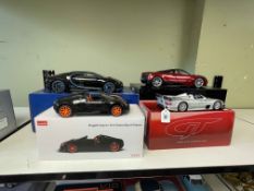 Four Super Car models, Kyosho Cheron, Rastar Veyron, Spirit Mercedes GTR and Autoart Pagani Huayria.