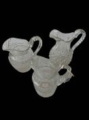 Three 19th Century glass lemonade jugs.