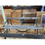 Cast naturalistic branch and wooden garden bench with nine spoke cast cartwheel back,