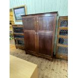 Early 20th Century mahogany two door compactum wardrobe, 177cm by 137.5cm by 55cm.