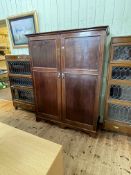 Early 20th Century mahogany two door compactum wardrobe, 177cm by 137.5cm by 55cm.