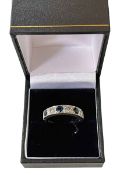 Sapphire and diamond 18 carat white gold half eternity ring, size Q.