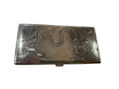 Chinese silver cigarette case with dragon decoration, 16.5cm by 8.5cm.