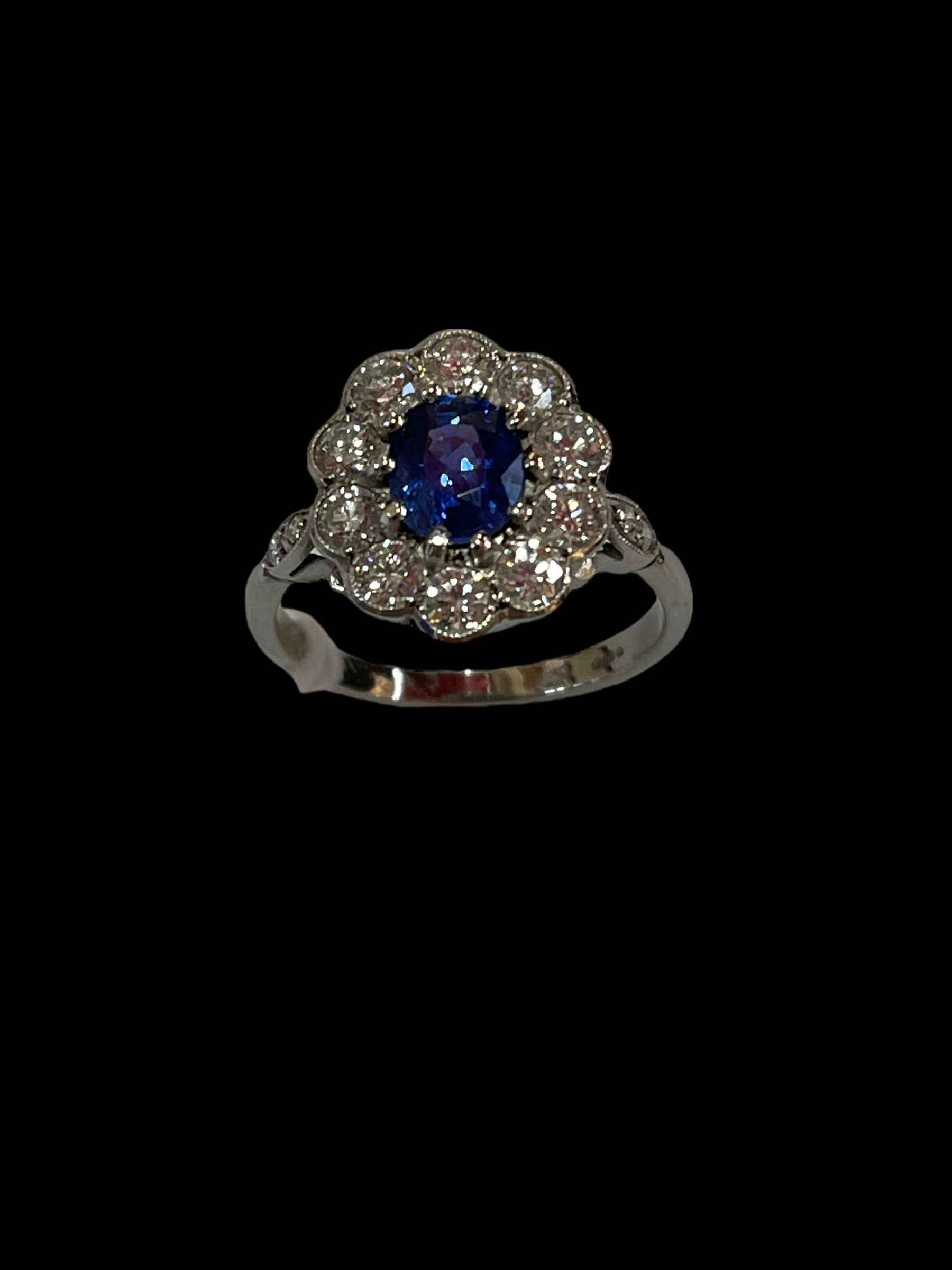 Stunning sapphire and diamond cluster 18 carat white gold ring,