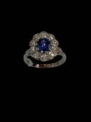 Stunning sapphire and diamond cluster 18 carat white gold ring,