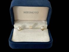 18 carat gold Mikimoto pearl earrings, boxed.